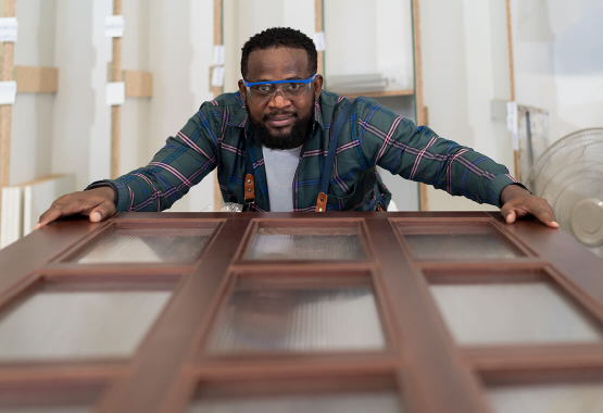 Man working on window