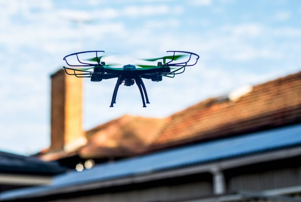 A drone is being used to asses the condition of a home's rooftop
