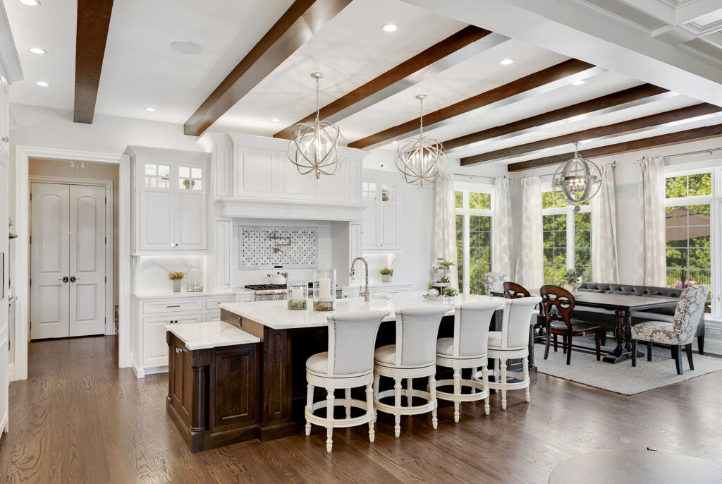 a traditional yet modern recently remodeled kitchen with a large island