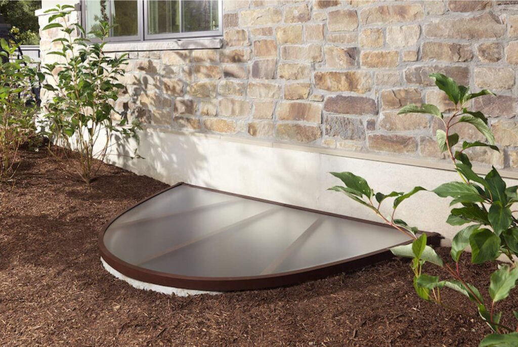 A newly, Get Dwell installed, window well cover on a Chicago area home.