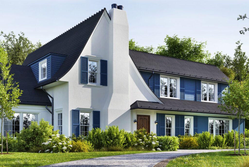 A stately, traditional white stucco home with deep blue shutters and a beautifully landscaped yard